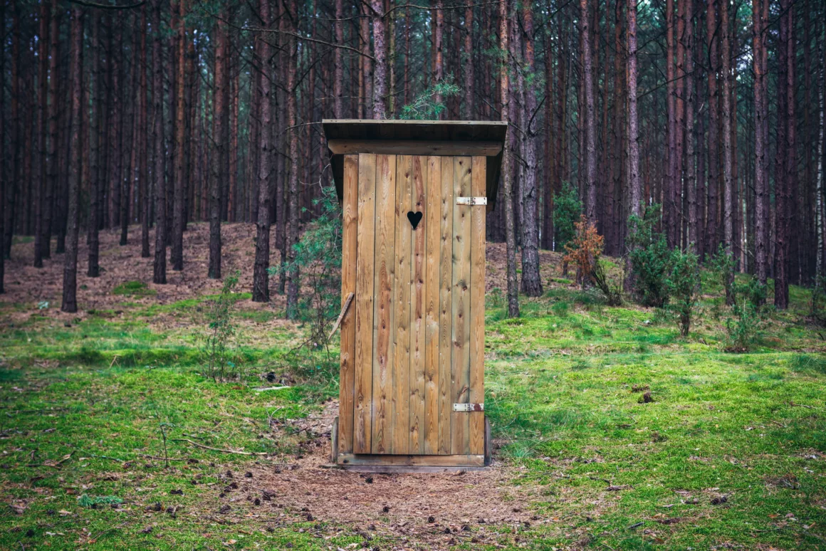 Outhouse in forest, Dziemiany commune of Cassubia region in Poland